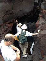 Kiko shows a lava crack with freshwater